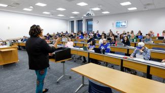 A faculty member teaches a class.